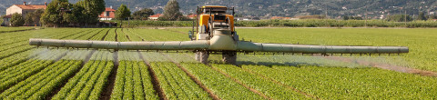 herbicide truck sprays GMO crops