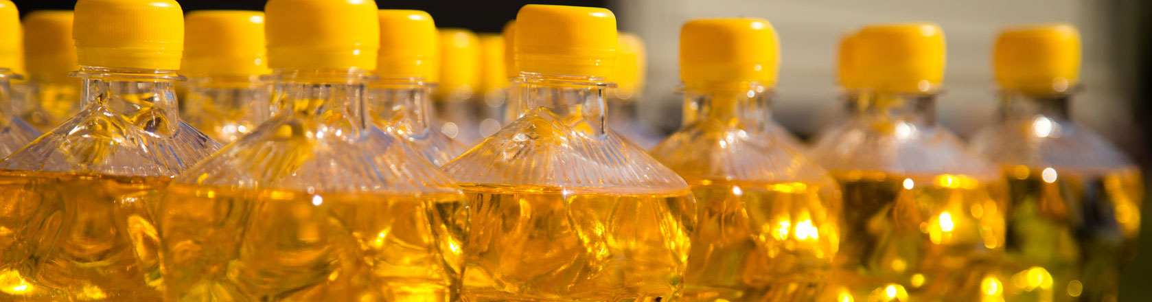bottles of canola oil but is it healthy?