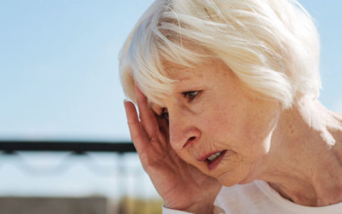 woman with symptoms of bradycardia low blood pressure