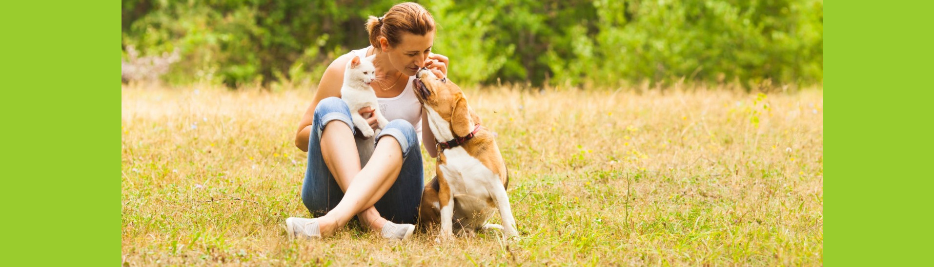 woman with beloved dog and cat using natural flea and tick prevention